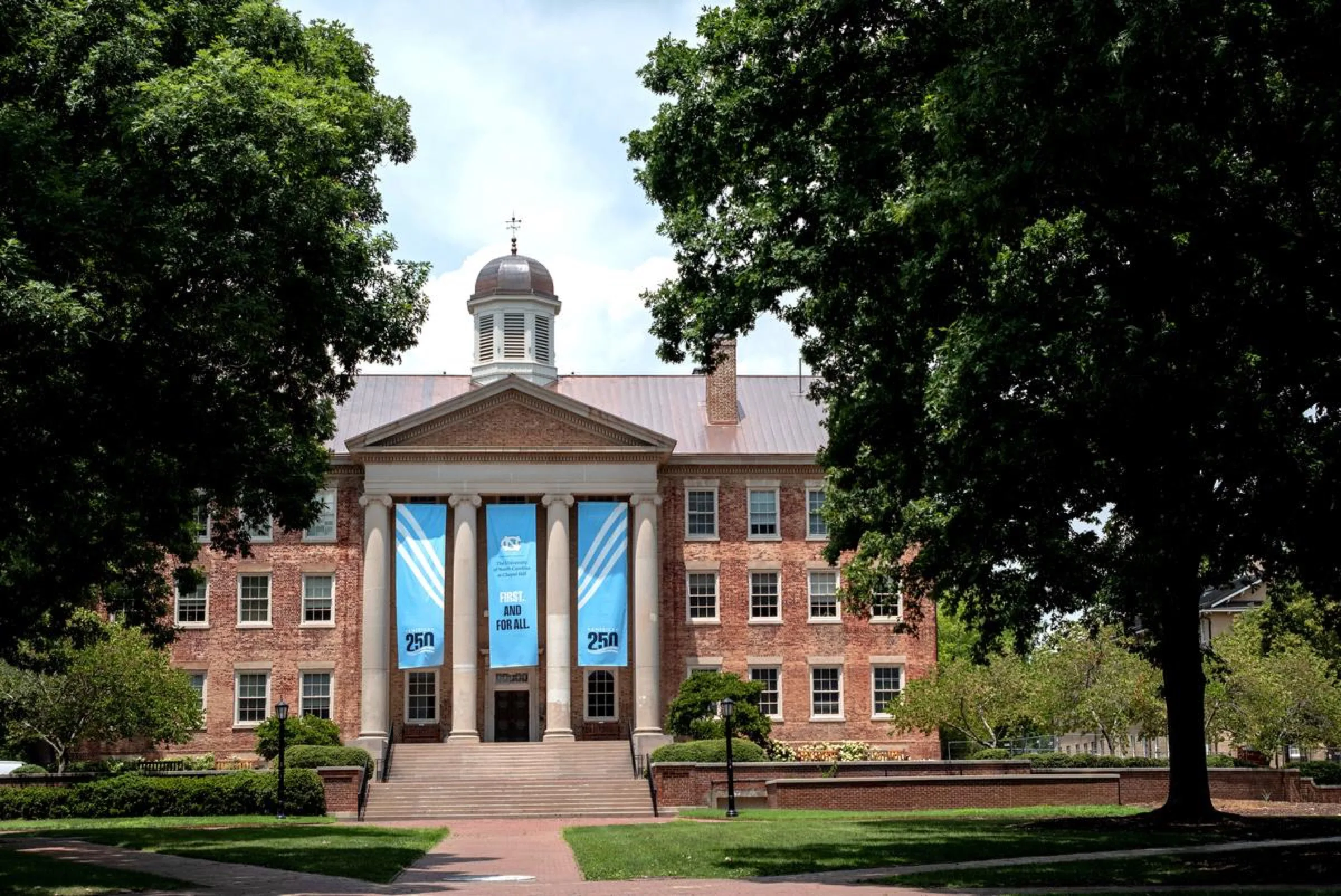 South Building with Carolina 250 and First and Best for All banners